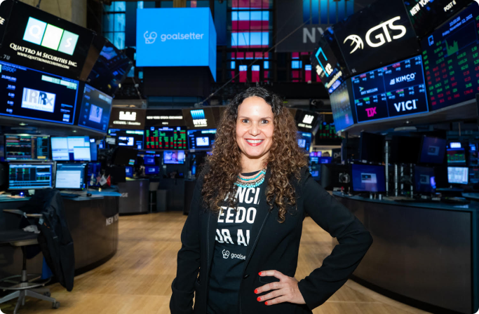 Owner of Hourwork standing on the floor of the stock market