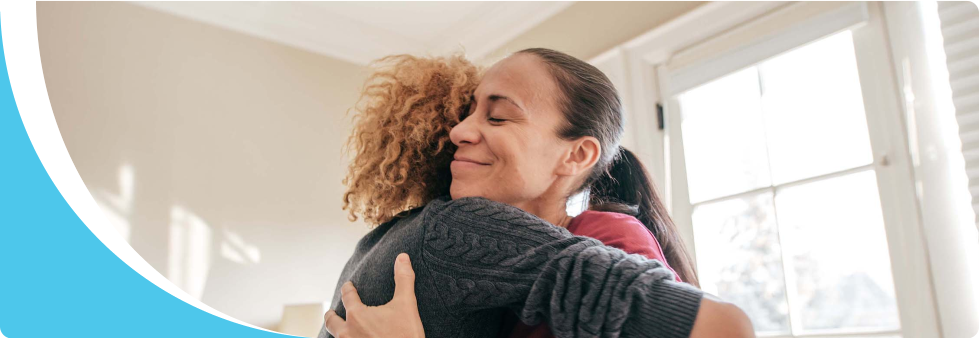 Two women hugging