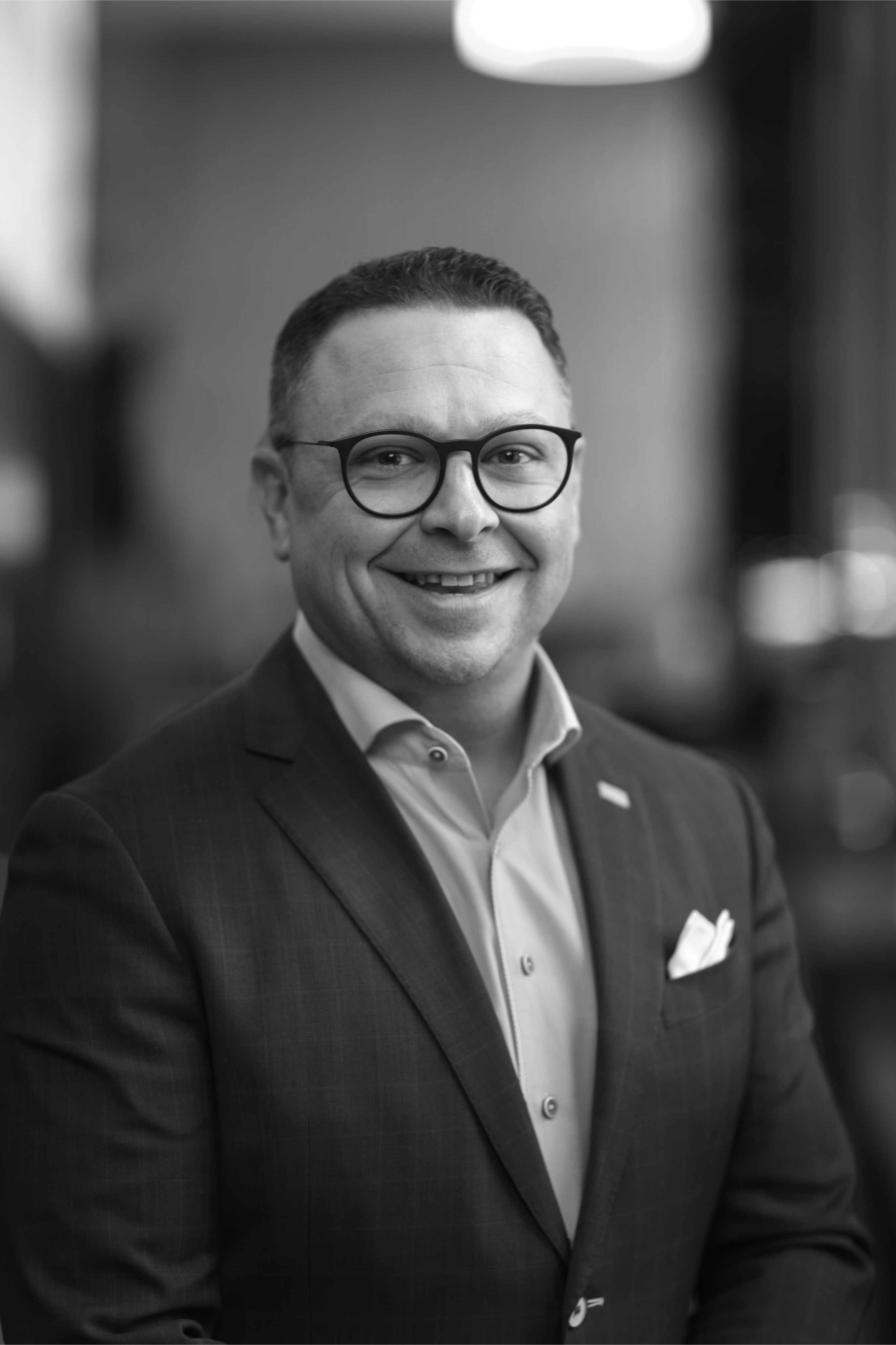 black and white head shot photo of Joshua Lubas, National Sales Manager MassMutual Strategic Distributors